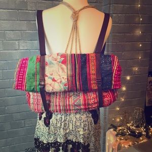 Tricia Fix embroidered foldover colorful backpack